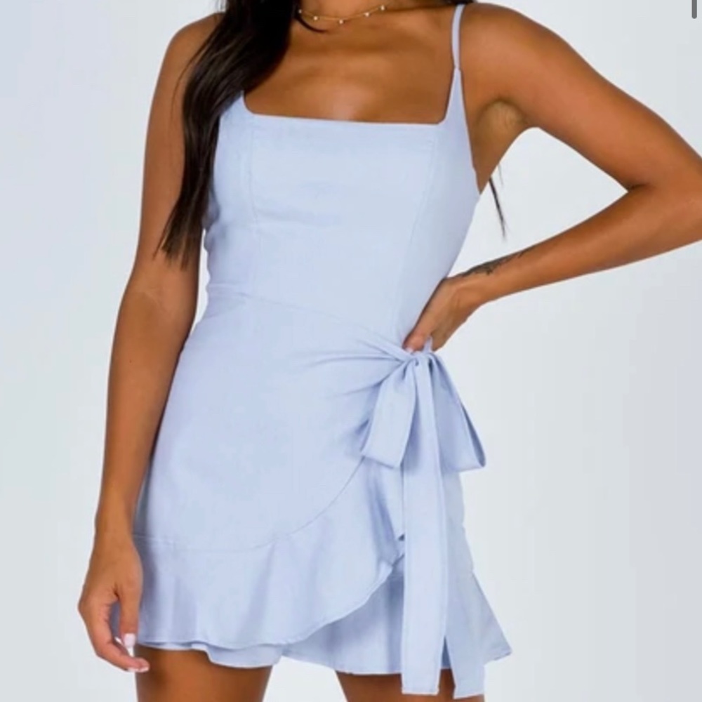 Baby blue mini dress with tie up bow on the side!
